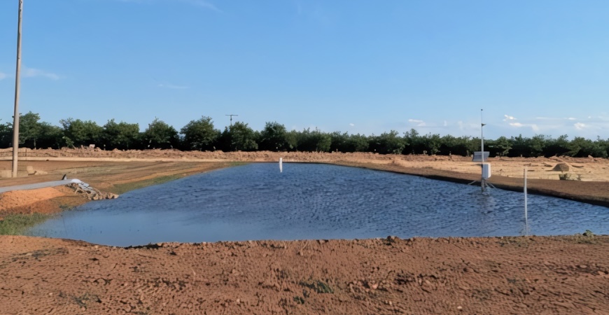 Photo depicts the reservoir at the UC Merced Experimental Smart Farm.