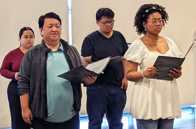 A group of UC Merced students rehearse "If All the Sky Were Paper"