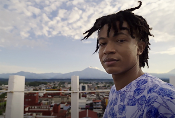 Still image of boy from film "Coronas Negras"