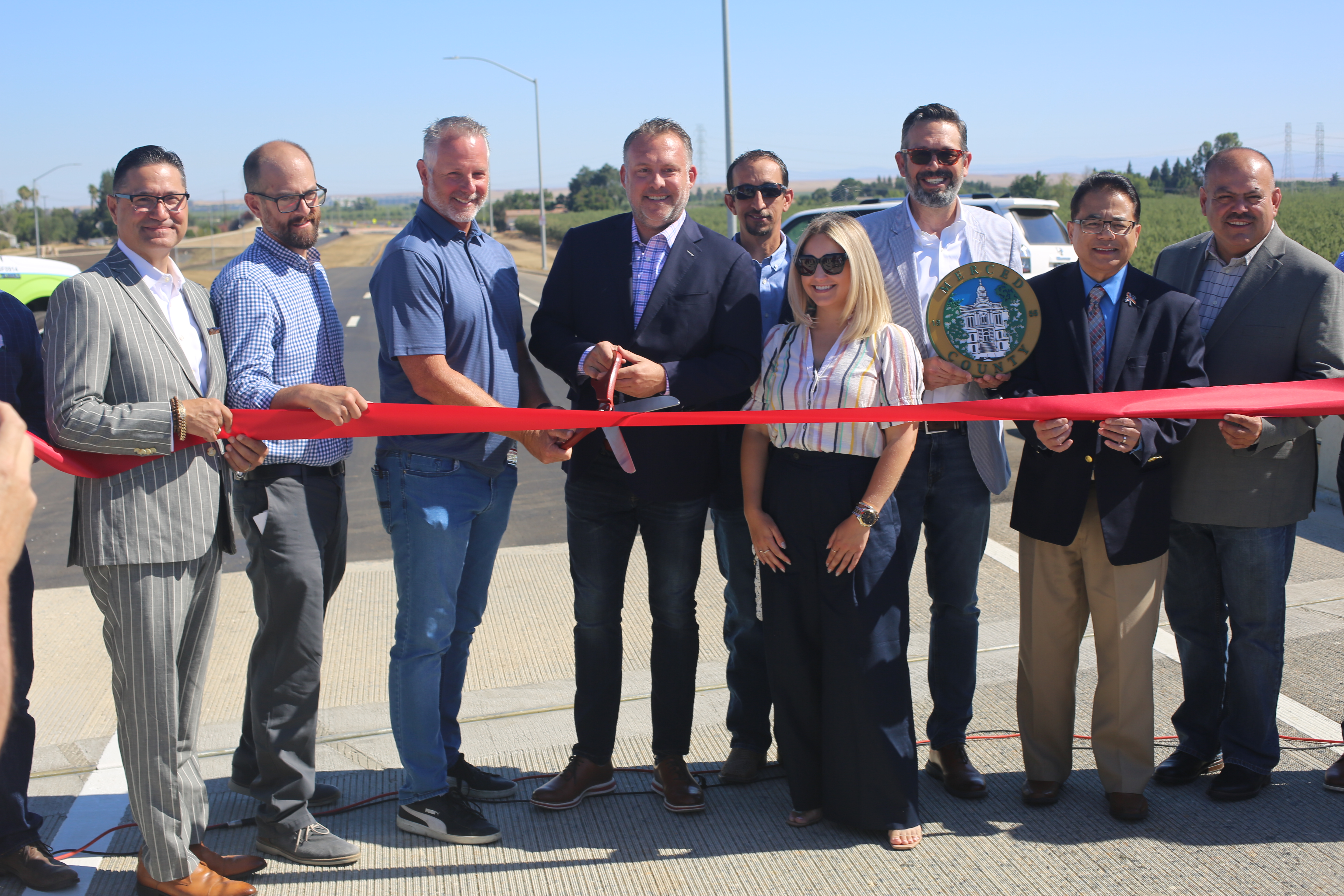 UC Merced Chancellor Juan Sánchez Muñoz poses for a photo with local state dignitaries.