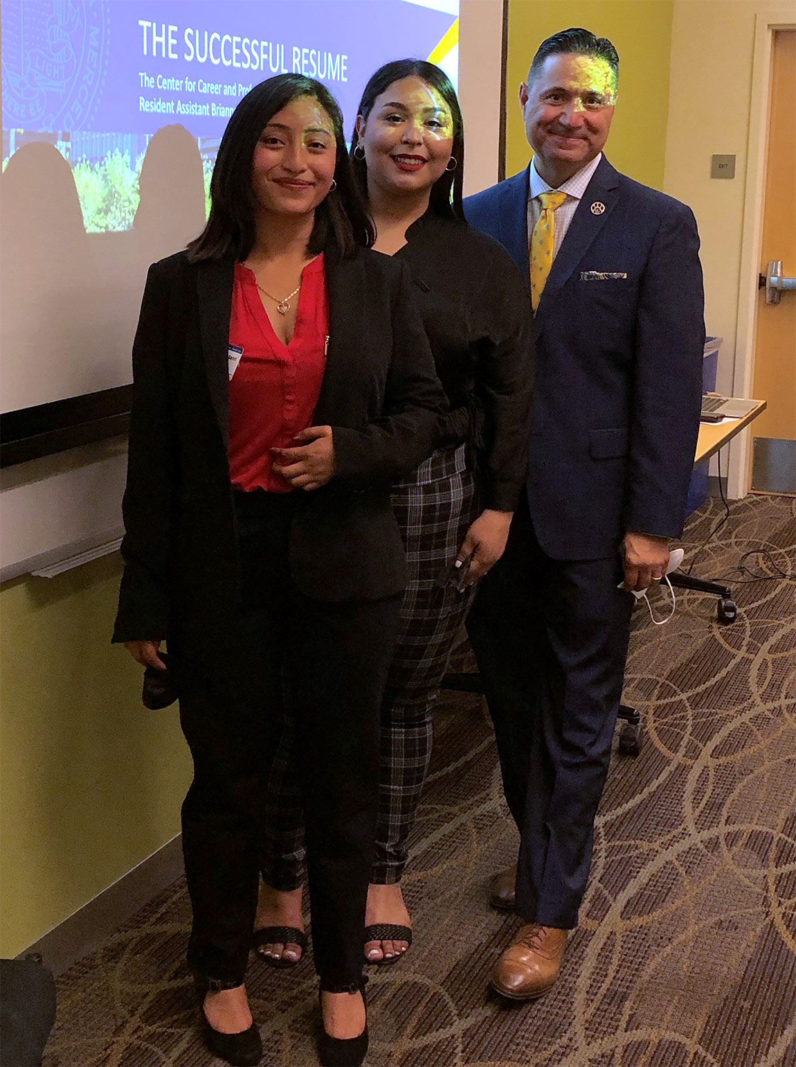 From left to right: Jesica Lopez Perez, Brianna Chavez Mancilla, Chancellor Juan Sánchez Muñoz