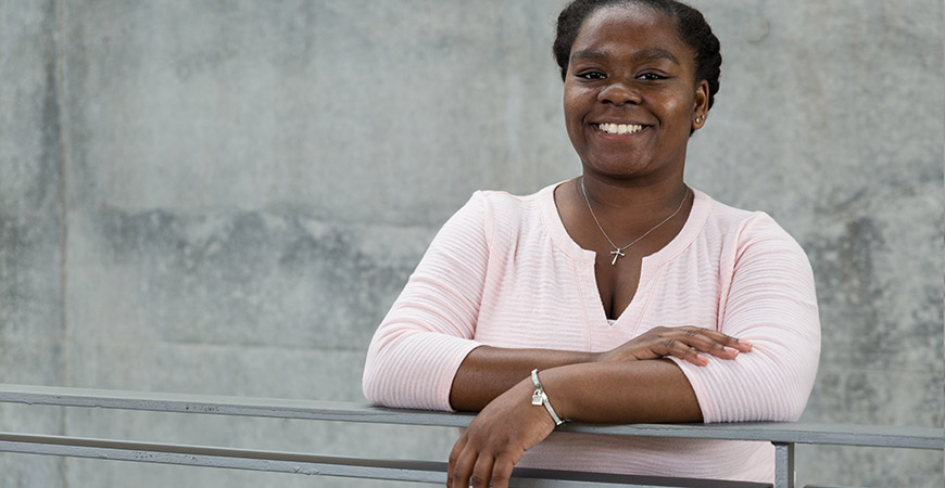 Tomanike Banks will receive a bachelor's degree in public health on May 12, then a month later her journey will take her to Sierra Leone with the Peace Corps. 