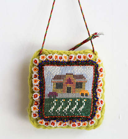 Bobcat Art Show piece, "Egrets Breeding Season in Front of Taco Bell," beadwork on crochet