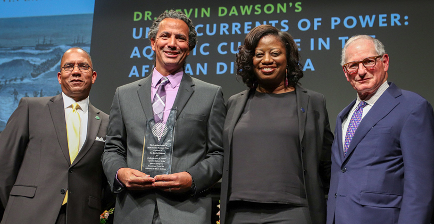 Professor Kevin Dawson receives the Harriet Tubman Prize for his book "Undercurrents of Power: Aquatic Culture in the African Diaspora" during an Oct. 10, 2019, ceremony at the Lapidus Center in New York.