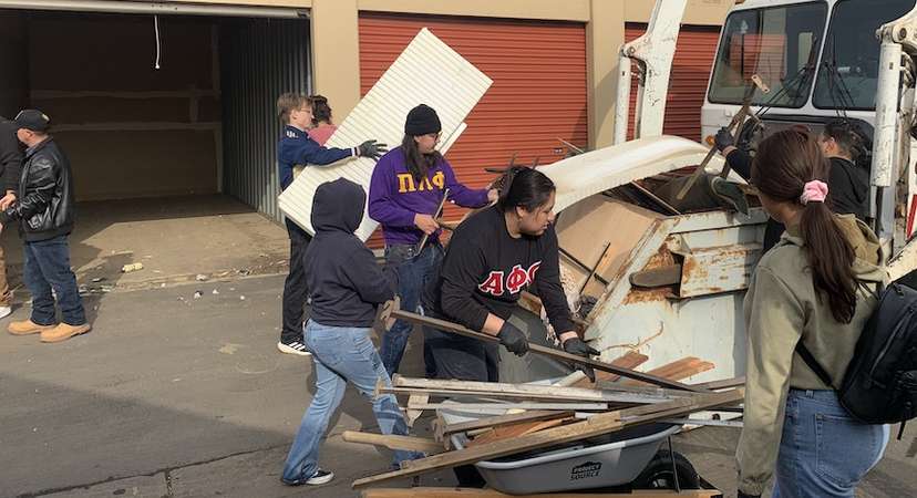 UC Merced students help clean out storage units that flooded in an early January 2023 storm.