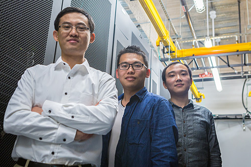 Professor Dong Li and graduate student researchers Yingchao Huang, center, and Luanzheng Guo are trying to improve supercomputing efficiency.