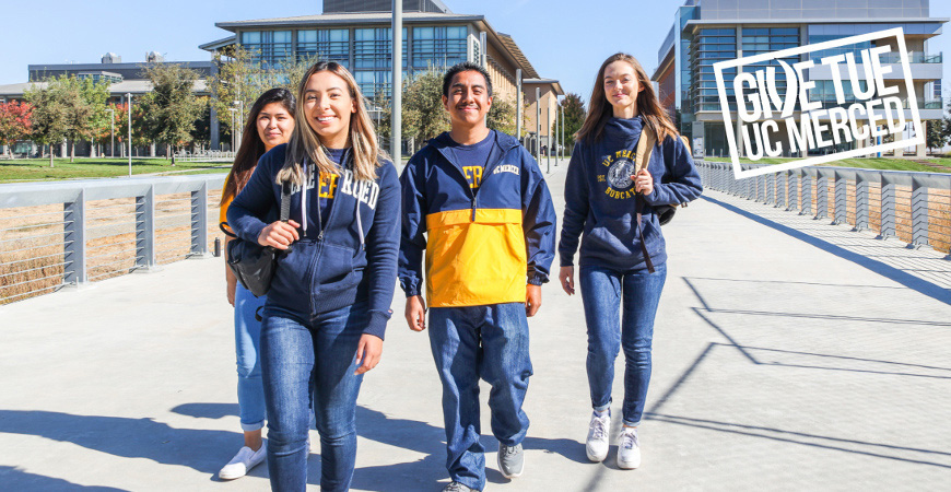 Students walk across campus at UC Merced
