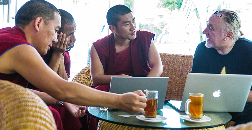 The monks take tea with Professor Noelle and continue discussing concepts in neuroscience.