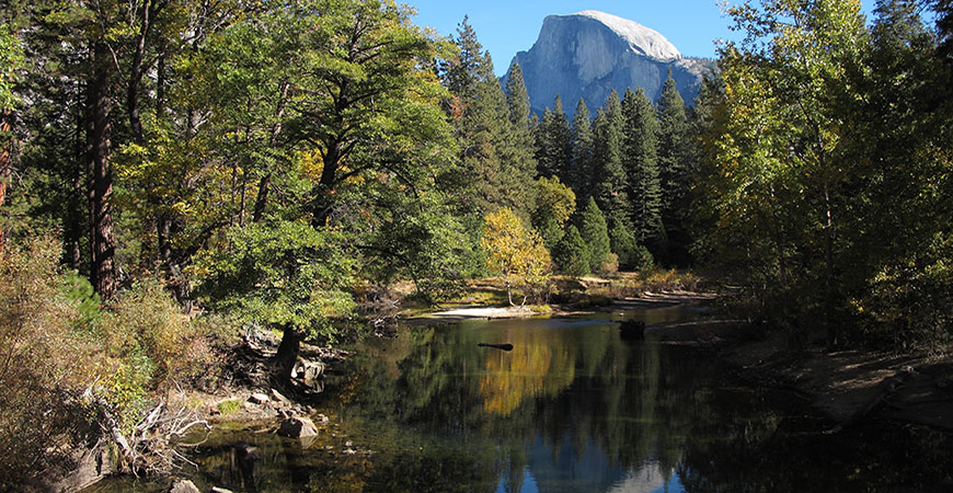 A view of Half Dome from the Merced River in Yosemite National Park