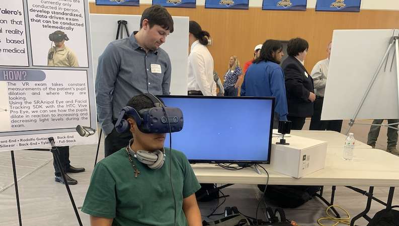Student Jose Sanez undergoes a virtual eye exam developed by a team at UC Merced's Innovate to Grow event, .