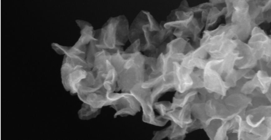Electron micrograph of crumpled sheets of molybdenum disulfide.
