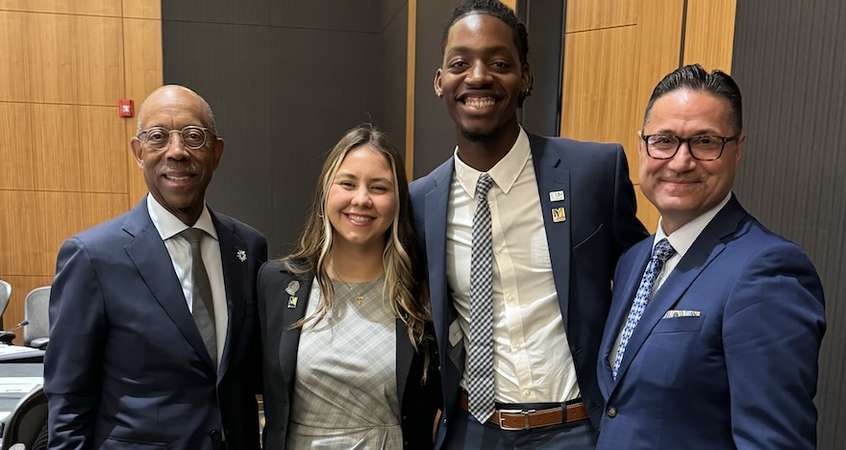 Pictured are UC President Michael Drake, UC Merced water polo player Jacquline Azevedo, UC Merced Chancellor Juan Sánchez Muñoz and basketball player Myles Haynes. 