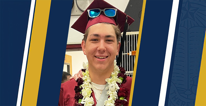 Robert St. Martin is seen in his high school graduation regalia.