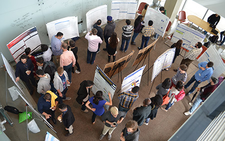 Students present original applied math research in the SIAM poster session.