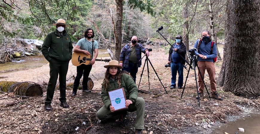 A group involved in the "Imogen in the Wild" film are seen in Yosemite National Park.