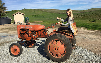 Growing up, Andrade loved playing with tools and tinkering with her grandfather’s old Allis-Chalmers tractor.