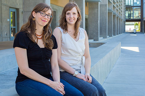 Postdoctoral scholar Makenzie Provorse, right, and Professor Christine Isborn work together to study molecules.